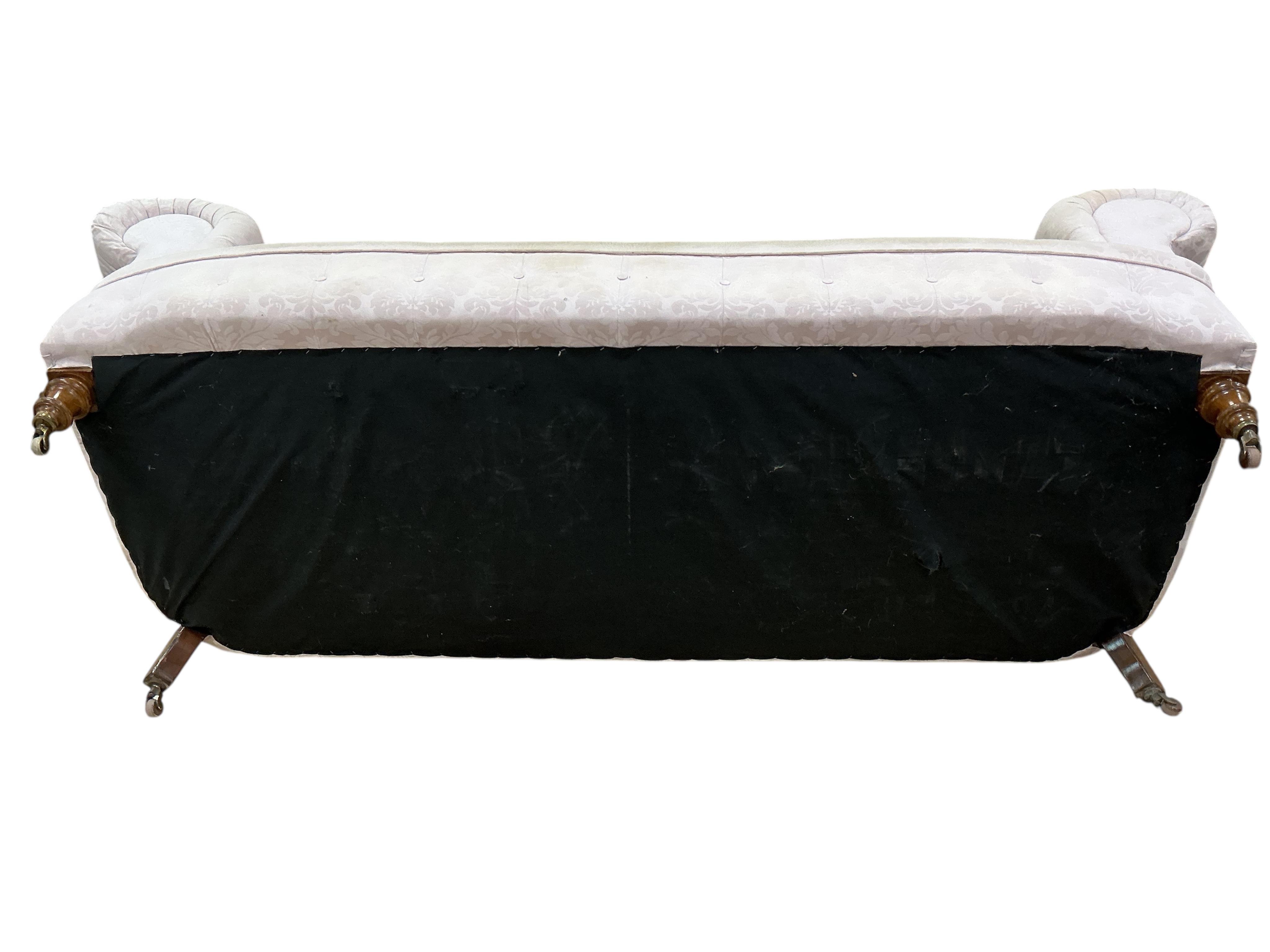 A Victorian deep buttoned Chesterfield settee, width 236cm, depth 91cm, height 84cm